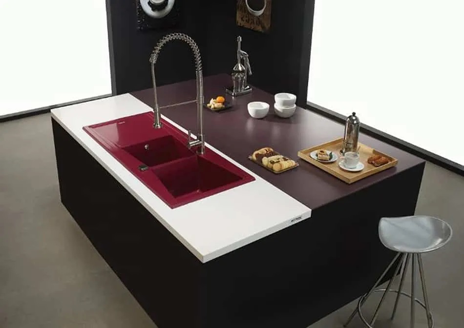 integrated into sinks with a hinged lid